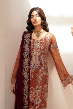 Brand: RamshaCollection: Rangoon Volume 12 Luxury Chiffon CollectionFabric: Chiffon PRODUCT DETAILS: Embroidered Chiffon front with sequins Embroidered Chiffon back Embroidered Chiffon sleeves Embroidered organza sleeves lace Embroidered organza ghera lace Embroidered Chiffon dupatta– 2.5 Yard Raw silk trouser – 2.5 Yard Embroidered organza trouser lace DISCLAIMER:* Lining, Laces, and Tassels are not included in unstitched variants.* Embellishment items in stitched outfits are subject to market availability.* The actual colors of the outfit may vary from the colors being displayed on your device. CARE INSTRUCTIONS: Extra Fabric Has Been Used For Shoot Original Color May Vary Slightly From The Picture Dry Clean Recommended Iron The Clothes At Moderate Temperature Do Not Use Bleach, Or Stain Akbar Aslam, Batik Print Dress, Lehenga Jewellery, Saree Sale, Embellished Shirt, Chiffon Sleeves, Organza Sleeves, Lehenga Style, Chiffon Collection