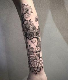 a person with a tattoo on their arm