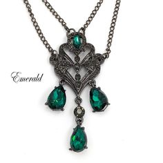 This handmade vintage crystal chandelier necklace is offered with Emerald, Gray or Black Rhinestones. The pendant measures 3" tall and 1.25" wide and is draped on a gunmetal toned chain in the length of your choice. If you're looking for a nice, visually appealing piece of vintage jewelry that is affordable, then these necklaces hit the target! Thanks for looking and please click =>here<= to view my complete vintage jewelry collection!