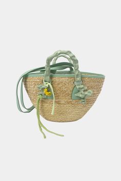 This product is final sale. Straw basket bag that features two iconic handles, brand signature embossed on the handles, leather shoulder strap and an internal storage bag with drawstring closure. All accessories are considered final sale Composition: 80% Straw, 20% Cotton Luxury Leather Basket Bucket Bag, Green Bucket Bag With Adjustable Strap And Top Handle, Spring Bucket Shoulder Bag With Handles, Luxury Green Top Handle Bucket Bag, Luxury Spring Bucket Bag For Daily Use, Luxury Green Bucket Shoulder Bag, Chic Straw Bag With Handle Drop For Daily Use, Natural Top Handle Bag With Handle Drop, Chic Leather Basket-shaped Bucket Bag