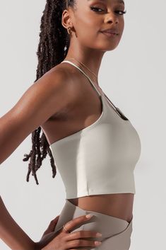 Whether your movement-of-the-day includes sunrise salutations or midday soirées, this crop top adds a touch of comfort and chic to every occasion. Compression Level: Performance Level: Olympic Lifting, Workout Crop Top, Cute Tops, Scoop Neckline, Fabric Care, Favorite Color, Spaghetti Strap, Perfect Fit, Crop Top