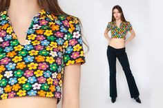 90s floral crop top! The fit: Designed to be fitted throughout The details: V neck  Pointed collar Short sleeves Floral print Stretchy fabric Short cropped lenght Color: Black, blue, yellow, green, orange, white, pink Type: Crop top Material: Spandex Best fits: Small - Medium (EU sizing) (check measurements for exact sizing) Circa: 1990s, 2000s Label: Avant, Made in Italy Condition: excellent vintage! MEASUREMENTS Taken from seam to seam while the garment is lying flat and are then doubled.  arm Fitted 90s Inspired Summer Tops, Spring Retro Print Short Sleeve Tops, Short Sleeve Top With Retro Print For Spring, 90s Style Short Sleeve Crop Top For Summer, Fitted Summer Tops With Retro Print, Spring 90s Inspired Short Sleeve Crop Top, 90s Retro Print Spring Tops, 90s Retro Print Tops For Spring, 90s Inspired Short Sleeve Crop Top For Spring