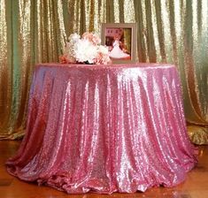 the table is covered with pink sequins