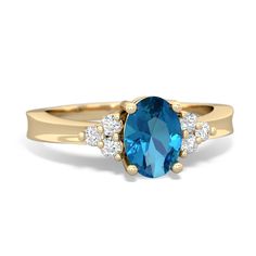 Dazzle your loved one with this exquisitely sculpted london topaz ring in 14K Yellow Gold that will instantly bring a smile to your face. This ring features a large oval cut navy blue london topaz, surrounded by {diamondcarats}. London Topaz Ring, London Topaz, Blue Topaz Jewelry, Tanzanite Jewelry, Topaz Jewelry, Tanzanite Ring, Swiss Blue Topaz, Blue Violet, Elegant Ring