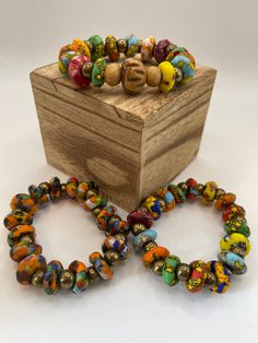 Women's Bohemian Multi Colored  Uniquely Styled Beaded Stretch Bracelet Cheap Colorful Hippie Beads, Luxury Multicolor Large Beads, Bohemian Multicolor Stretch Bracelet For Beach, Bohemian Wooden Beads Stretch Bracelet, Hand-strung Bohemian Stretch Bracelet, Adjustable Bohemian Stretch Bracelet With Wooden Beads, Multicolor Bohemian Beaded Bracelets, Festival Stretch Bangle Bracelet With Large Beads, Festival Bangle Stretch Bracelet With Large Beads