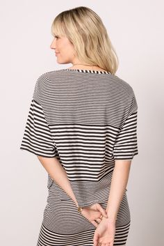 This striped boatneck tee by Sundry is an elevated everyday staple, featuring a relaxed silhouette, elbow-length sleeves, and cotton-linen blend fabric. Wear half-tucked into cutoffs, or complete the set with the matching Nuevo Stripe Skirt. | SUNDRY Women's Stripe Boat T-Shirt, Size XL, Black Relaxed Fit Short Sleeve Tops With Horizontal Stripes, Casual Horizontal Stripe Everyday Tops, Striped Relaxed Fit Tops For Everyday, Summer Tops With Horizontal Stripe Pattern For Everyday, Everyday Summer Tops With Horizontal Stripes, Everyday Summer Top With Horizontal Stripes, Everyday Short Sleeve Tops With Vertical Stripes, Black Top With Horizontal Stripes And Relaxed Fit, Casual Oversized Top With Horizontal Stripes