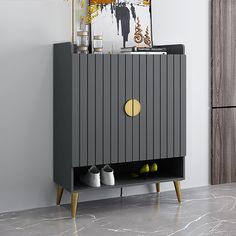 a grey cabinet with yellow accents in a room