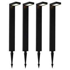 three black posts with lights on them in front of a white background and the bottom one is