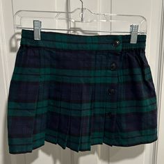 New With Tags Navy And Green Skirt. Size 10. Preppy Mini Skirt For Winter School Season, Gap Casual Fitted Mini Skirt, Preppy School Skirt Bottoms, Winter Cotton School Skirt, Winter School Cotton Skirt, Winter School Bottoms: Lined Skirt, Winter School Skort With Lined Skirt, Winter School Lined Skirt, Winter Skort For School