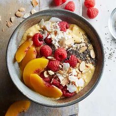 an oatmeal with fruit and nuts in a bowl