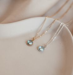 Reminiscent of crystal clear waters this blue CZ stone echoes the March birthstone - aquamarine. Our beautiful drops necklace is crafted for not just for March babes or those with March babes but as a symbol of youth, health and hope. Drops Necklace, Rectangle Necklace, Tiny Pendant, Hope Necklace, Oval Necklace, Symbol Necklace, March Birthstone, Zodiac Necklaces, Crystal Clear Water