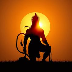 the silhouette of a person sitting in front of a sun