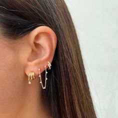 The Diamond Marley Mini Huggie Earring features two curved diamond bars, fused together to create a step design. Whether worn in the lobe or higher up the ear, this huggie knows how to work its angles. Step Design, Huggie Earring, Steps Design, Diamond Bar, How To Work, The Ear, All That Glitters, Delicate Earrings, Huggies Earrings