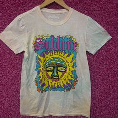 Sublime 40 Oz To Freedom Celestial Rock Tie Dye Womens Top M Generally Measures 17 Inches Pit To Pit And 28 Inches Long Never Worn First Hand Overstock Great Condition With An Amazing One Of A Kind Graphic For Fans Of The Legendary Ska Rock Band Sublime. This Tee Has Markings From The Manufacturing Process That Could Possibly Wash Off Green Summer Concert Top, Green Summer Concert Tops, Green Summer Top For Concerts, Multicolor Band Merch Tops For Summer, Green Band Merch Tops For Summer, Multicolor Casual Tops For Concert, Pink Y2k Festival Tops, Casual Multicolor Tops For Concert, Groovy Summer Streetwear Tops