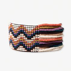 Charlie Wavy Half Woven Beaded Stretch Bracelet Citron + Coral WIDE STRETCH Adjustable Multicolor Artisan Wrap Bracelet, Artisan Beaded Multicolor Wrap Bracelet, Brown Heishi Beads Bracelet, Artisan Multicolor Beaded Wrap Bracelet, Brown Heishi Beads Bracelet With Colorful Beads, Brown Heishi Beads Bracelets With Colorful Beads, Multicolor Wooden Beaded Bracelets, Multicolor Hand-strung Wrap Bracelet For Festival, Multicolor Bohemian Beaded Bracelets