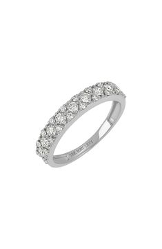 a white gold ring with rows of diamonds