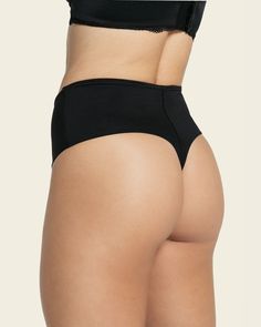 A high-waisted thong with luxurious satin details. An inner layer of PowerSlim® offers moderate compression to flatten the tummy and shape the waist. The thong bottom doesn't show under clothes, making this the perfect panty to wear under fitted pants, dresses, skirts, and more! Sleek High Stretch Solid Shapewear, Sleek High Stretch Solid Color Shapewear, Bra Friendly Full Coverage Elastane Shapewear, Elegant High Stretch Seamless Shapewear, Solid Color Brief Shapewear Bottoms, Compressive Full Coverage Bottoms With Smoothing Details, High Stretch Full Coverage Swimwear With Medium Bust Support, Solid High-cut Leg Smoothing Bottoms, High Stretch Shapewear With Wide Waistband