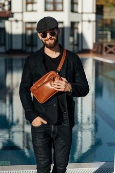 Shop for a wide range of men's, women's and unisex fanny packs or hip bags with SKINandSKIN. This is the trendiest messenger bag to be wearing right now. Made of premium quality cognac leather this medium size waist bag is an essential accessory for travel or everyday city life. Actually, it is not only a belt or bum bag but also a handbag which can be easily worn crossbody. On a date or a casual meeting, party or concert - the small purse is a must-have of the fall and summer fashion season. Th