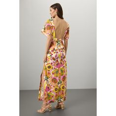 Yellow floral (100% Cotton). Casual dress. Short sleeves. Boat neck. Pull-on closure. 55.5" from shoulder to hemline. Made in the USA of imported fabric.¬† Floral Print Midi Dress For Garden Party, Chic Daywear Dresses For Garden Party, Chic Dresses For Garden Party Daywear, Feminine Dresses For Beach And Garden Party, Chic Garden Party Day Dresses, Spring Tropical Print Maxi Dress With Short Sleeves, Spring Maxi Dress With Tropical Print And Short Sleeves, Chic Floral Print Daywear Dresses, Elegant Vibrant Print Maxi Dress For Summer