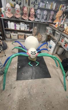 a large spider sculpture sitting on top of a table