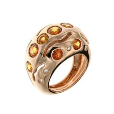 Rose gold 18k ring with orange sapphires 3.90 ctw and diamonds 0.20 ctw Finger Size 5 1/2, can be resized. Handcraftd in Italy by Botta Gioielli. It is stamped with the Italian Mark 750 - 716MI Handcrafted in: 18k rose gold. 10 brilliant cut natural orange sapphires: 3.90 ctw. 10 brillian cut natural diamonds: 0.20 ctw. Finger size: Us 5.5, Italian 11, French 51. Total weight: 16 grams. ________________________________________________________________________ Something about Botta Gioielli... Bot Rose Gold Cocktail, Sapphire Cocktail Ring, Gold Cocktail Ring, Gold Cocktail, Orange Sapphire, Diamond Cocktail Rings, Modern Ring, Domed Ring, Classic Ring