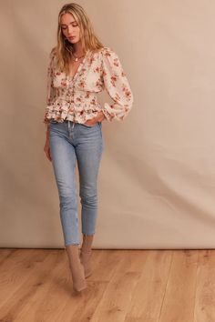 Introducing Allegra! This must-have long-sleeve top features delicate ruffle detailing and a stunning deep v-neckline. Both feminine and flirty, she's made from our softest Natural Dainty Floral printed cotton voile and white trim accents. Pair her with jeans or a skirt for the perfect day-to-night outfit! Julia is 5'1 Feminine Fashion Style, Charlotte Outfits, Ruffle Tops Outfit, Lady Outfits, Ruffles Top, Feminine Outfits, Natural Essence, Fashion Vocabulary, Feminine Blouses