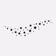 a black and white photo of stars in the sky with an airplane flying above them