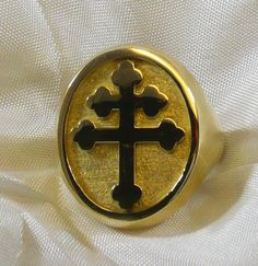 "Lorraine Cross ring in solid sterling silver. Yellow gold plated. Any Size Available Each ring is sized to your exact size in the wax stage before casting. The seal measures 27/32 \" x 45/64\" mm 21,5 x 17,70 Weights 15 grams Each ring is made to size Anello Croce di Lorena in argento 925 millesimi dorato" Classic Gold-tone Rings, Gold-tone Polished Finish Rings, Classic Gold Plated Engraved Ring, Polished 14k Gold-tone Rings, Gold Sterling Silver Rings, Tarnish Resistant, Gold-tone 14k Gold Ring For Gift, Classic Gold-tone Rings With Polished Finish, Gold Sterling Silver Rings Tarnish Resistant, Luxury Jewelry Ring With Shiny Finish