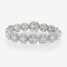 Gift this luxurious diamond tennis bracelet on an anniversary, birthday, or holiday occasion. This exquisite bracelet consists of baguette-cut and round brilliant-cut diamonds that are prong and channel set in each cushion-shaped link, making a statement piece that exudes vintage-inspired luxury. Wear with our matching ring and earrings. Natural Diamonds: 14.00ctw 14K White Gold Length: 7 Inches