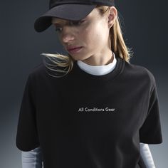 Amber, coal and gold give "ACG" a new meaning for this tee inspired by the team's time in Alaska. A loose fit and sweat-wicking tech work together to help keep you comfortable. Nike Black Athleisure T-shirt, Crew Neck T-shirt For Streetwear Athleisure, Nike T-shirt With Text Print For Sports, Nike Cropped Short Sleeve T-shirt For Sports, Nike Black Fan Apparel T-shirt, Athleisure T-shirt With Letter Print, Nike Sporty Black T-shirt, Nike Team Spirit Short Sleeve T-shirt, Black Nike Fan Apparel Tops