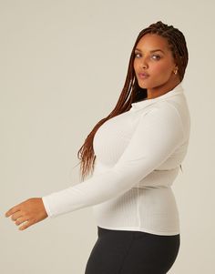 The Curve Half Button Long Sleeve Top is simple enough to always be in style. This plus size long sleeve tee is about as versatile as it gets. Pair it with some sweatpants for the quintessential loungewear look or dress it up with a midi skirt and high heels for a chic, European street style look. This top features a button and collar neckline, a full length, and long sleeves. This top is made from 95% polyester and 5% spandex. Hand wash cold. Made in USA. Model is wearing a size 1XL. European Street Style, European Street, Button Long Sleeve, Street Style Looks, Long Sleeve Tee, Long Sleeve Top, Always Be, Midi Skirt, Full Length