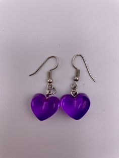 Materials Used:   -jump ring -1/2 inch hard plastic charm -Nickel Free Fish Hook  -Pack of 1 set Clear Plastic Jewelry For Gifts, Clear Plastic Jewelry As A Gift, Clear Plastic Jewelry Gift, Cute Hypoallergenic Clear Jewelry, Nickel-free Plastic Jewelry Gift, Heart-shaped Resin Jewelry For Valentine's Day, Trendy Purple Heart Earrings As Gift, Heart Shaped Resin Jewelry For Valentine's Day, Trendy Purple Heart Earrings For Gift