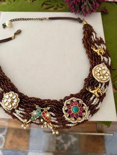 Traditional Jeweled Beaded Necklaces For Wedding, Traditional Jeweled Beaded Necklace For Weddings, Elegant Embellished Beaded Necklaces With Round Beads, Elegant Embellished Necklaces For Celebration, Traditional Embellished Festive Jewelry, Traditional Festive Embellished Jewelry, Traditional Embellished Jewelry For Festive Occasion, Traditional Embellished Wedding Jewelry, Elegant Multicolor Necklaces With Gold Beads