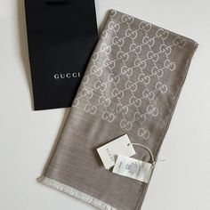 Nwt Gucci Gg Jacquard Wool/Silk Blend Shawl/Scarf. 100% Authentic 70% Wool 30% Silk New With Tag Made In Italy 45x180cm Year: 2023 Includes Bag Elegant Gucci Silk Scarves, Elegant Gucci Silk Scarf, Designer Gucci Silk Scarves, Luxury Gucci Silk Scarves, Luxury Beige Scarf For Formal Occasions, Luxury Beige Formal Scarf, Luxury Cream Silk Scarf, Accessories Board, Gucci Ghost