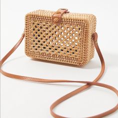 Cute Structured Bag With Woven Details Faux Leather 4” Handle Drop Chic Rectangular Box Bag For Vacation, Spring Rectangular Box Bag With Removable Pouch, Summer Rectangular Box Bag With Detachable Strap, Chic Box Bag With Adjustable Strap For Vacation, Chic Natural Color Rectangular Box Bag, Chic Natural Rectangular Box Bag, Spring Rectangular Satchel, Chic Rectangular Natural Box Bag, Chic Straw Satchel Bag With Phone Holder