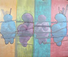 three different colored paintings on canvass with clothes pins attached to them