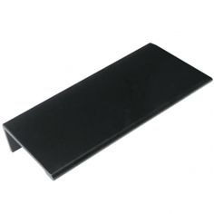 a black shelf sitting on top of a white wall