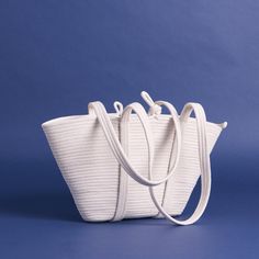 Plain Rope Market Bag — APPRVL White Basket Bag For Spring, White Basket Bucket Bag With Braided Handles, Everyday Bucket Beach Bag With Rolled Handles, White Basket Straw Bag For Everyday Use, White Basket Straw Bag For Daily Use, White Handmade Bucket Beach Bag, White Basket Bucket Bag For Vacation, Bucket Beach Bag With Rolled Handles, Eco-friendly White Bucket Bag With Double Handle