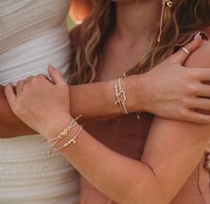 Introducing our "Mother/Daughter" set. This heartfelt bracelet hair tie set symbolizes the eternal bond between mother and daughter, with four heart charms expressing that the daughter's heart came from and is forever connected to her mother's. Whether worn in the hair or on the wrist they are adjustable to fit any size so that mother and daughter can share. Please allow 5-8 business days for shipping. Adjustable Heart Bracelet With Extender, Dainty Beaded Bracelet With Heart Charm, Double Heart Bracelet For Mother's Day, Heart Bracelet For Friendship And Mother's Day, Mother's Day Adjustable Heart Beads Charm Bracelet, Mother's Day Adjustable Charm Bracelet With Heart Beads, Adjustable Beaded Bracelets For Anniversary On Mother's Day, Mother's Day Friendship Beaded Bracelet With Heart Charm, Adjustable Heart Beads Bracelets For Anniversary