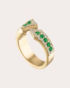 Designed to mimic the look of sunlight filtering through stained glass windows, this 14-karat gold ring decorates its pointed, open ends with tsavorite garnet and white diamond embellishments. From GiGi Ferranti’s Lucia Collection, shining creations named for the Italian word for ‘light’. 14k yellow gold, tsavorite garnet and diamond Carat: 0.58 ctw diamond, 0.71 ctw tsavorite garnet Polish with soft cloth Made in the USA Measurements Band width (at widest): 0.53in Luxury Silver Tsavorite Rings, Luxury Tsavorite Rings, Luxury Gold Tsavorite Rings, Italian Word, Tsavorite Garnet, Diamond Carat, Stained Glass Windows, Glass Window, White Diamond