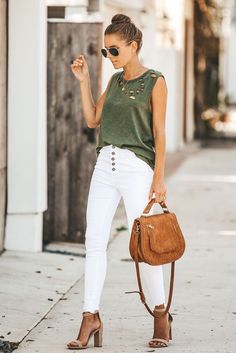 Keep your summer vibes chic and comfortable in this women's distressed tank in olive green. It features a relaxed fit with a crew neck and distressing around the collar.  STYLE: Pair with your fave leggings, and sneakers for a casual look or your best-fitting jeans or cut-off shorts with heels or cute sandals for the perfect summer-chic look. FIT: Semi-relaxed fit, size up for an extra relaxed fit. SIZING: Small (0-4) Medium (6-8) Large (10-12) XLarge (14-16) XXLarge (18-20) Olive Green Top, Sleeveless Tops Summer, Spaghetti Strap Maxi Dress, Green Tank Top, Sleeveless T Shirt, Green Tank, Simple Chic, Summer Chic, Green Top