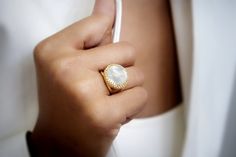 An exquisite piece from our handcrafted selection of 14k rings for women - stunning Pearl ring elegantly crafted in 14k yellow gold-filled setting. Express yourself or your affection and love for someone special with this statement ring. ☛ 𝒜𝐵𝒞 - Add Engraving - https://etsy.me/2ZSRjhu ☛ Ring size - Select the size you would like from the drop down menu ♥ Gemstone Type - Mother Of Pearl ♥ Gemstone Size - 16mm ♥ Gemstone Cut - Round ♥ Metal Type (Main Photo) - 14k Gold Filled - Other options av Elegant Yellow Gold Moonstone Ring With Bezel Setting, Elegant Moonstone Ring With Bezel Setting As Gift, Elegant Moonstone Promise Ring With Bezel Setting, Luxury White Moonstone Promise Ring, Elegant Yellow Gold Moonstone Ring Gift, Elegant Gold Moonstone Ring, Luxury White Moonstone Ring For Wedding, Elegant White Moonstone Round Ring, Elegant White Filigree Promise Ring