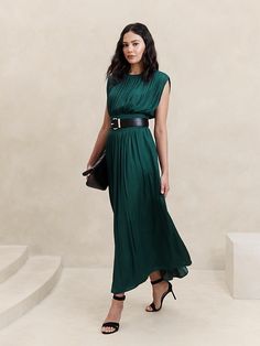 Chic Midi Dress With Folds For Work, Green Evening Dresses With Accordion Pleats, Pre-draped Sleeveless Dress For Work, Chic Pleated Back Maxi Dress For Work, Maxi Length Pleated Waist Workwear Dress, Chic Maxi Dress For Work, Chic Workwear Maxi Dress With Pleated Back, Green Pleated Draped Dress, Chic Draped Dress With Pleated Waist