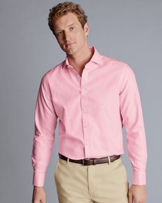 100% cotton with mechanical stretch, Available in classic, slim and extra slim fit, Spread collar, Classic and slim fit: back pleats, Extra slim fit: back darts, Mitred button cuff with two buttons or square french cuff, Machine washable - Cutaway Collar Non-Iron Clifton Weave Shirt - Pink | Men's Charles Tyrwhitt Cutaway Collar Non-Iron Clifton Weave Dress Shirt - Pink Single Cuff Size 14.5/32 Cotton Classic Fitted Shirt With Welt Pockets, Formal Tops With Welt Pockets And Spread Collar, Classic Business Tops With Welt Pockets, Classic Formal Tops With Welt Pockets, Fitted Tops For Business In Spring, Fitted Button-up Dress Shirt With Welt Pockets, Slim Fit Shirt With Welt Pockets For Work, Pink Slim Fit Dress Shirt For Semi-formal Occasions, Semi-formal Slim Fit Top With Spread Collar