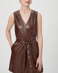 Crafted from our soft stretch faux leather, this chic dark brown mini dress is designed with a v-neckline, pleats, and a self-tie at the waist. The Luisa Dress will be the go-to for your next night out. | Luisa Dress - Rum Raisin Faux Leather | Size 12 Brown Leather Dress For Night Out, Leather Belted Dress For Date Night, Brown Faux Leather Mini Dress For Date Night, Brown V-neck Mini Dress For Work, Brown Leather Mini Dress For Night Out, Chic Brown Belted Mini Dress, Brown Belted Dress For Date Night, Chic Brown Leather Dress, Chic Brown Faux Leather Dress