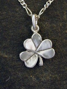 Sterling Silver Clover Pendant on a Sterling Silver Chain. Silver Charm Necklaces With Adjustable Chain For Good Luck, Celtic Knot Earrings, Clover Pendant, Seahorse Pendant, Tahitian Black Pearls, Wax Casting, Lost Wax Casting, Knot Earrings, Lost Wax