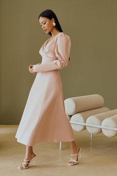 Fabric: Heavy Satin Cotton 50%, Polyester 50% V-neck dress Puffed sleeves Long sleeves Bow on back detail Zipper on back Dress lenght: 125 cm/ 49,2 inSleeve length: 68 cm/ 26,7 in Colors: White, Sky-Blue, Dusty Pink Chic Pink Midi Dress With Gathered Sleeves, Pink Satin Dress With Puff Sleeves, Pink Midi Dress With 3/4 Sleeves For Party, Elegant Pink Midi-length Puff Sleeve Dress, Pink V-neck Puff Sleeve Dress With Gathered Sleeves, White Sky, Bow Back, Dress Dusty, Satin Bow