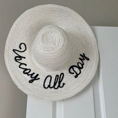 White Hat With Black Writing On The Back. Floppy, Classic Style Wide Brimmed Hat. New And Never Worn, But No Tags On It. White Beachy Sun Hat One Size Fits Most, White Vacation Hat, One Size Fits Most, White Short Brim Sun Hat For Vacation, White Beachy Hat, One Size Fits Most, White Boater Hat With Short Brim For Beach Season, White Flat Brim Hat For Beach Season, White Beachy Hat, White Wide Brim Hat For Vacation, Beachy White Hat