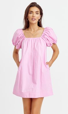 Poplin mini dress with dramatic puff sleeves and flattering square neckline. The shift dress features hidden pockets for convenience. Midi dress Bubblegum pink Pockets Self: 70% Viscose 30% Nylon Lining: 100% Polyester Length: 33 1/2" Chest: 17 3/4" Self: 100% Cotton Lining: 100% Cotton Hand wash cold water with similar colors. Hang dry. Low iron, or dry clean Model is wearing a size small Style #: G242D5752 Cruise Fits, Adorable Dresses, Recruitment Outfits, Beach Fits, Tulip Sleeve, Midi Shift Dress, School Events, Luxury Women Fashion, Grad Dresses