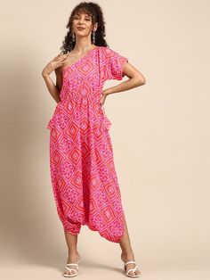 One Shoulder Bandhani Print Dhoti Jumpsuit vitansethnics Pink Printed Sets For Diwali, Summer Party Sets With Gota Work, Festive Bandhani Print Sets For Party, Festive Bandhani Print Party Sets, Summer Festive Bandhani Print Sets, Festive Summer Bandhani Print Sets, Bollywood Bandhani Print Sets For Summer, Eid Party Bandhani Print Sets, Fitted Jumpsuits And Rompers For Summer Festivals